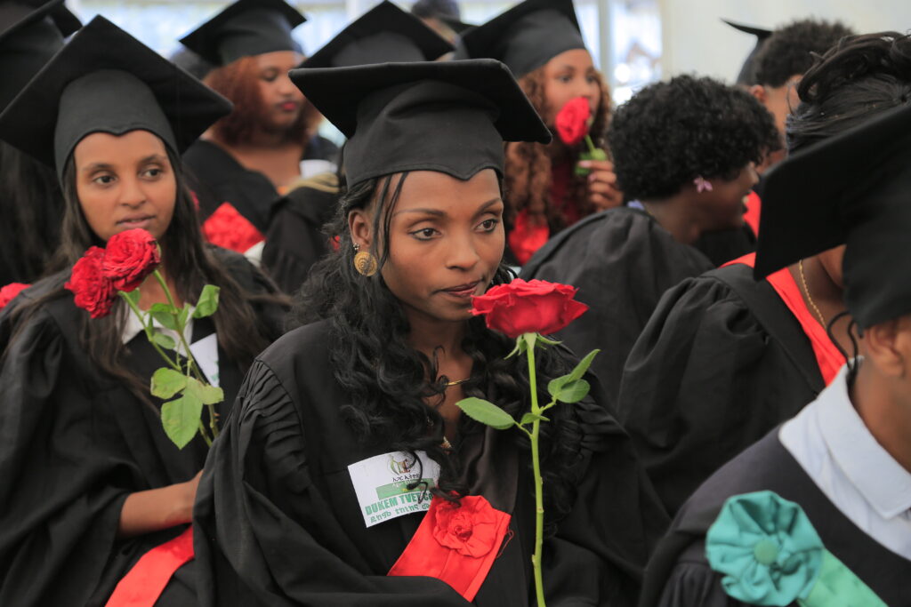 AGAR Ethiopia graduates celebrating with flower